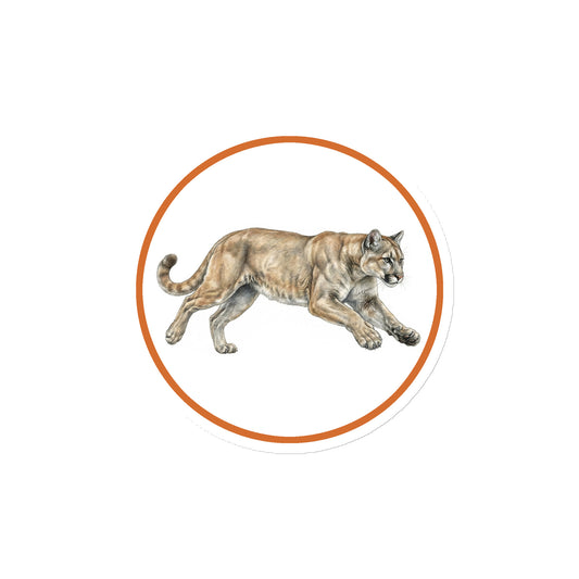 Product mockup of Mountain Lion Circular Magnet, a 4" die-cut magnet featuring a realistic cougar within a orange circle.