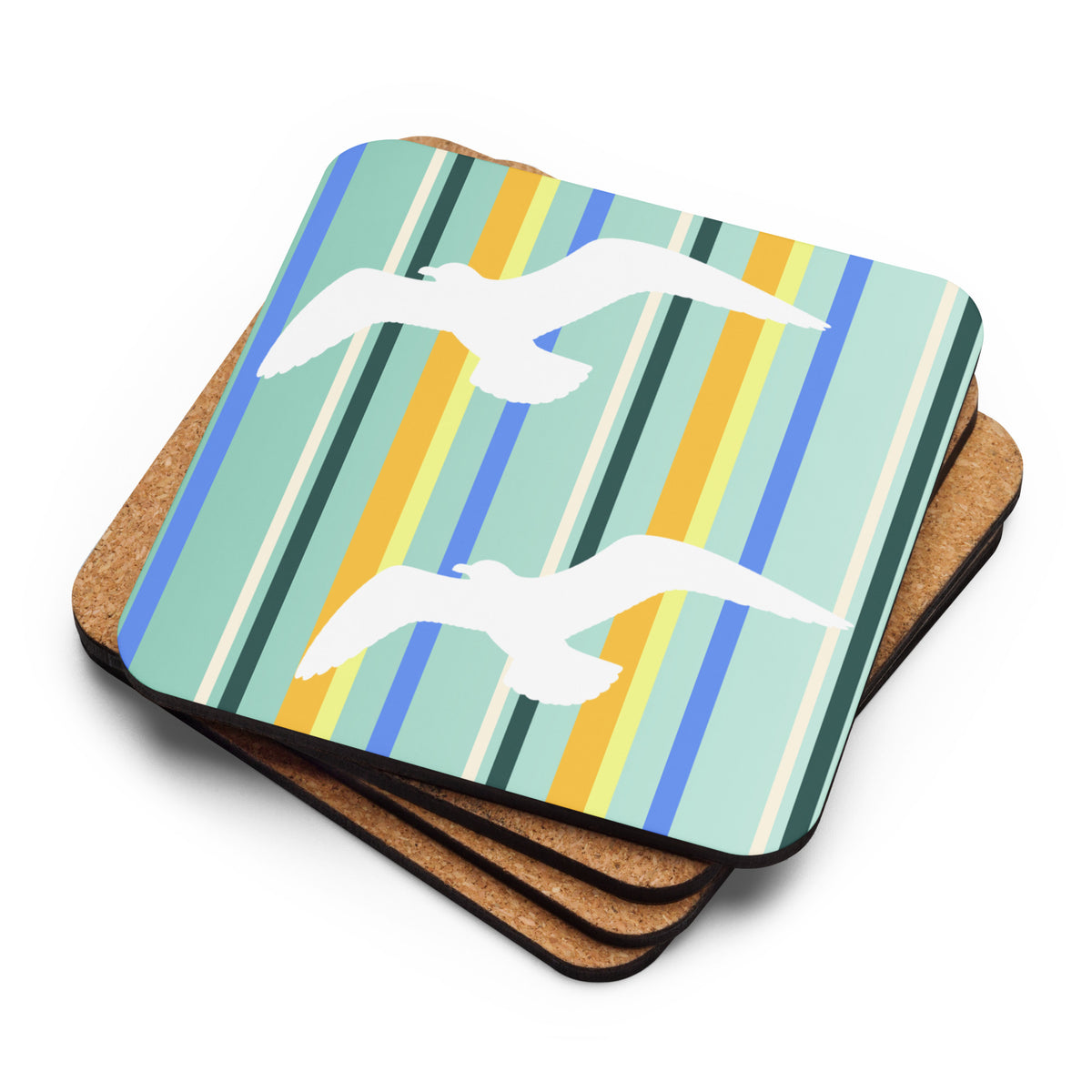 Product mockup of a stack of four Petals & Paws Cove Coasters. The top one reveals seagulls are flying against a teal striped pattern, while the ones underneath are flipped upside down to reveal their cork-backs.