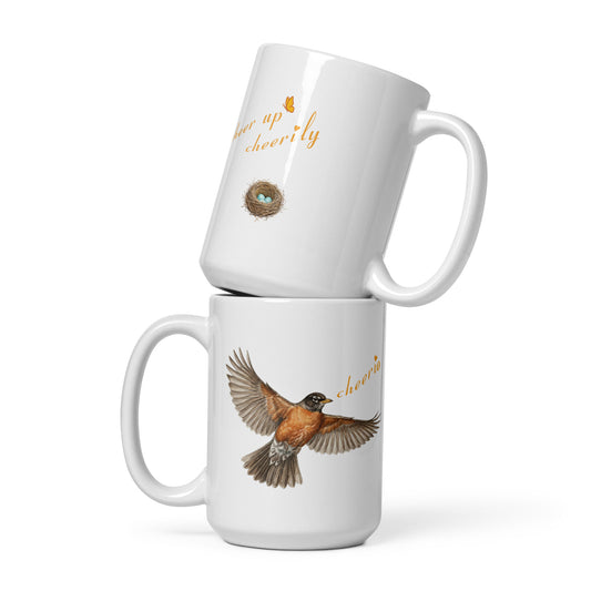 Product mockup, two 15 oz stacked Robin Discovery Ceramic Mugs, the bottom one reveals the front flying robin design and the top reveals the back nest of robin-blue design.