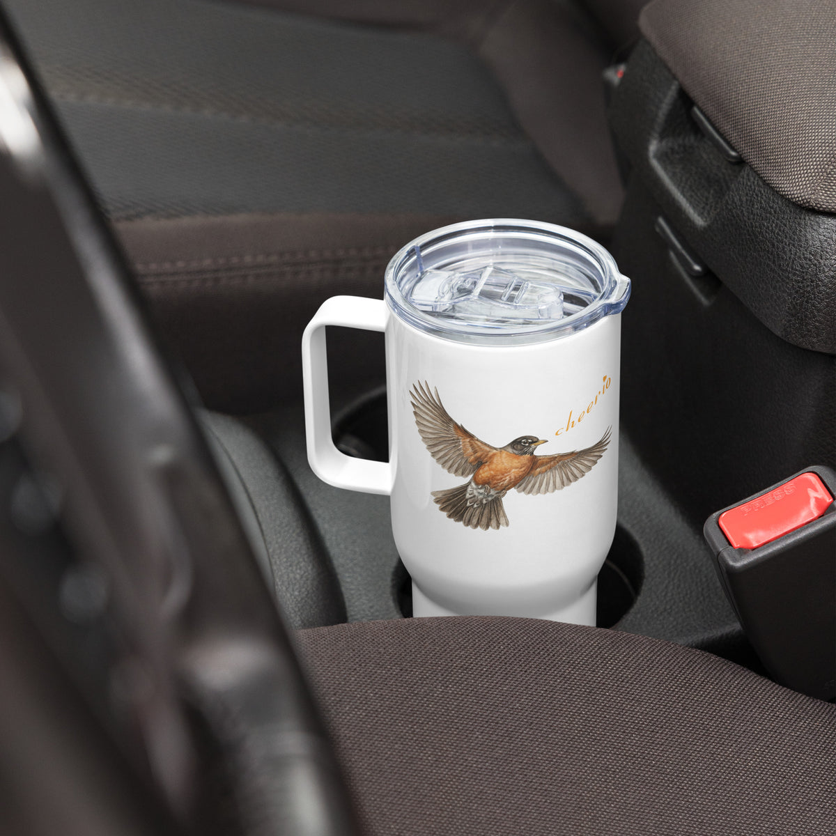 In-action image of Robin Discovery Travel Mug sitting in a vehicle cup holder.