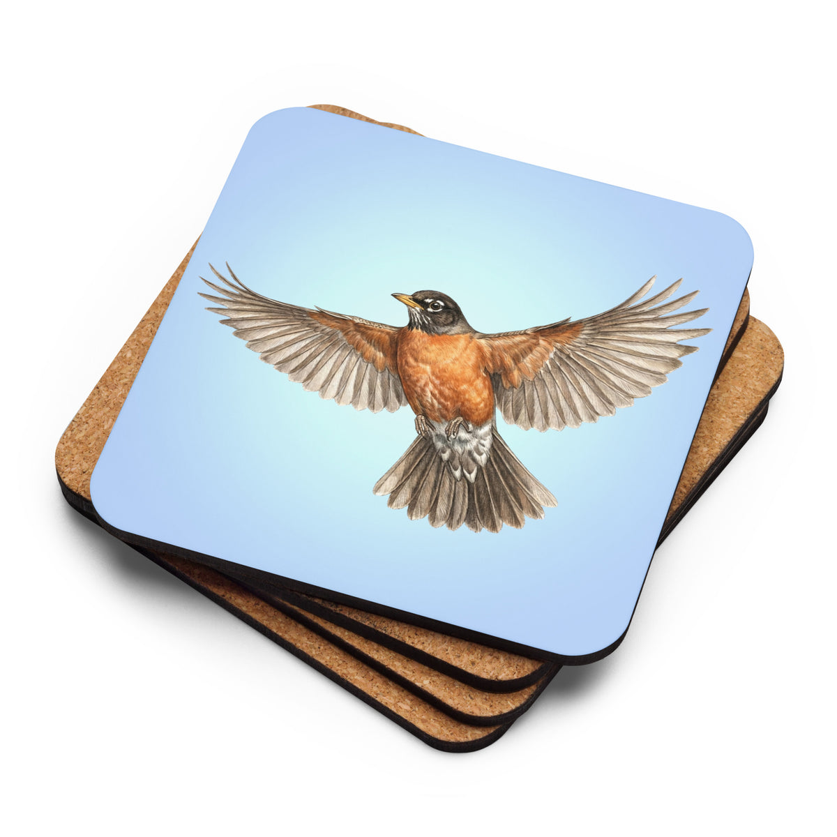 Product mockup of a stack of four American Robin Coasters.  The top one reveals the robin flying against a clear blue sky, while the ones underneath are flipped upside down to reveal their cork-backs.