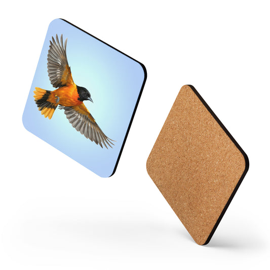 Two square Baltimore Oriole coasters appear to be dancing against a white background, one showing the oriole is flying against a clear blue sky on the front, while the other shows the cork on the back.