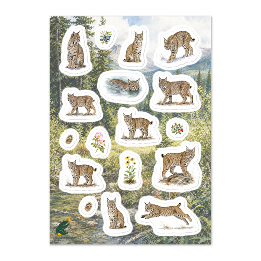 A glossy wildlife sticker sheet showing bobcats in various still and motion postures, set against a scene in the foothills of the Rocky Mountains.  Ideal for travel journals, envelopes, and outdoor adventure scrapbooks.