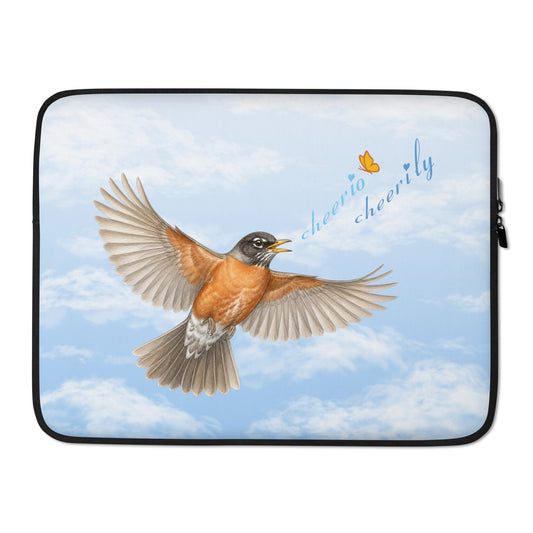 Product mockup of the 15" Cheerily Robin Laptop Sleeve, with a flying robin, singing, "cheerio cheerily" against a fair blue sky and fluffy cloud background. The Petals & Paws orange and yellow butterfly accents the songster's text.  The sleeve has black binding and zipper.