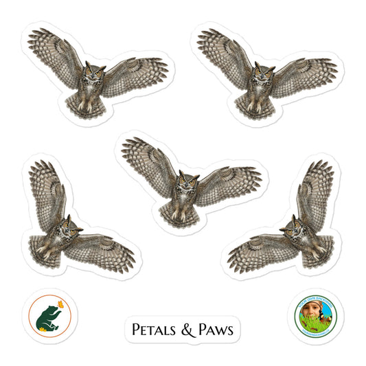 Product mockup of a sheet of five 2.5" wide Great Horned Owl kiss-cut stickers. This sheet features realistic, illustrated Great Horned Owl, along with Petals & Paws and Your Own Backyard logo stickers.