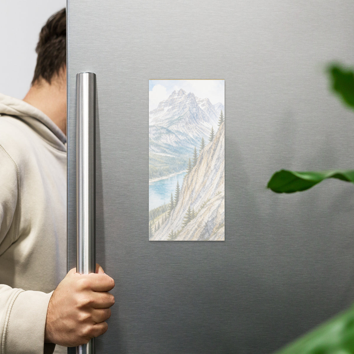 High Rock magnetic notepad, 4.25″ × 9″ (10.8 cm × 22.9 cm) displayed on fridge.  Overall design of Rocky Mountain Icefields terrain.