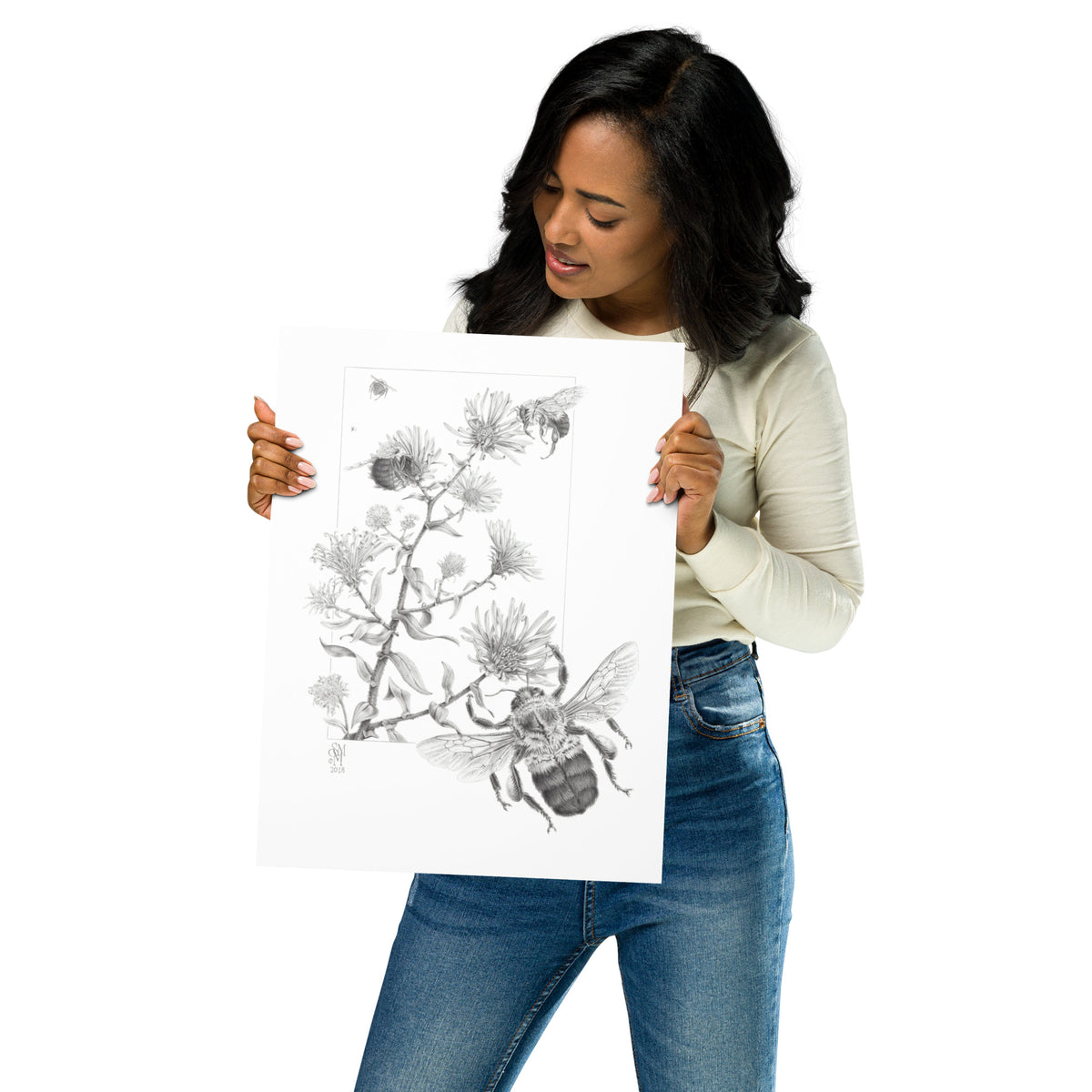 Person holding 12x16 inch museum-quality print of Late Autumn Forage illustration of bumblebees and asters to show relative size. Graphite illustration by Suzanne Matheson, 2017.