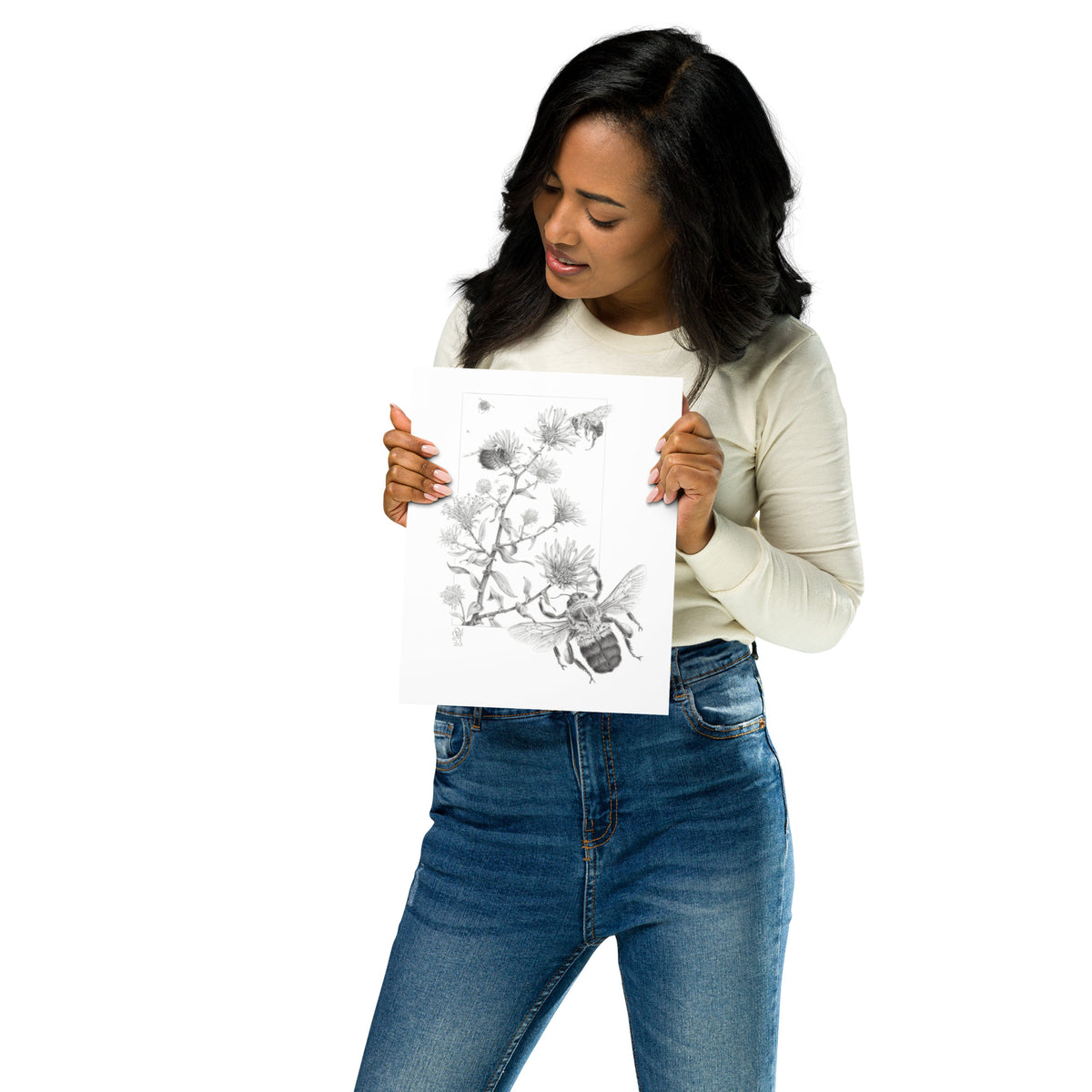 Person holding 8x10 inch museum-quality print of Late Autumn Forage illustration of bumblebees and asters to show relative size. Graphite illustration by Suzanne Matheson, 2017.