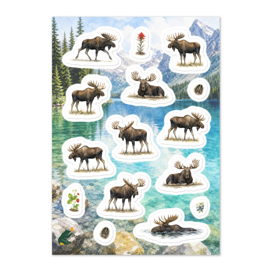 A glossy wildlife sticker sheet showing powerful bull moose in various postures, set against a Rocky Mountain lake scene.  Ideal for travel journals, envelopes, and outdoor adventure scrapbooks.