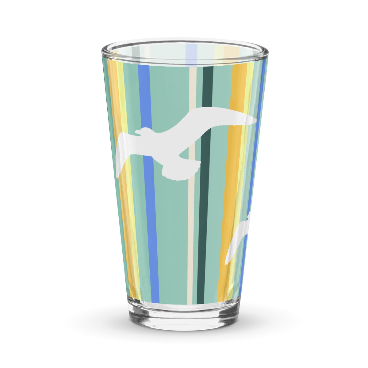 Product mockup of 16 oz Petals & Paws Cove Pint Glass, featuring seagull design with teal striped pattern.