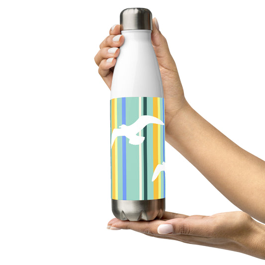 A 17 oz Petals & Paws Cove Water Bottle held by two hands in a presentation style. This bottle features seagull design with teal striped pattern.
