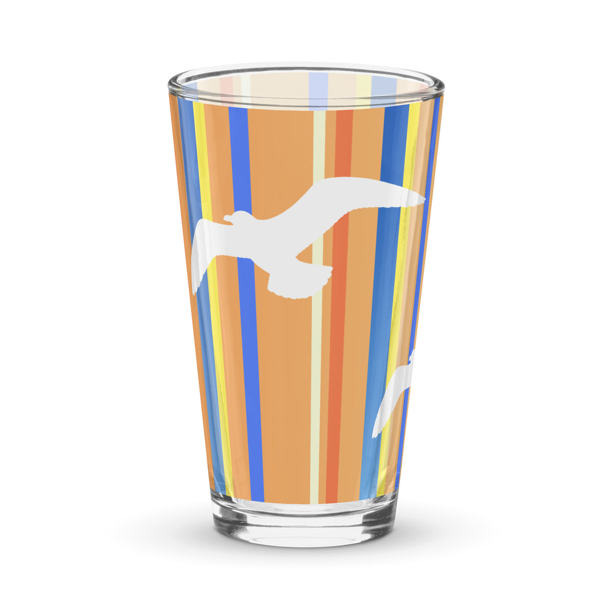 Product mockup of 16 oz Petals & Paws Drift Pint Glass, featuring seagull design with orange striped pattern.