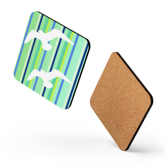 Two square Petals & Paws Harbour coasters appear to be dancing against a white background, one showing the seagull green striped pattern on the front, while the other shows the cork on the back.