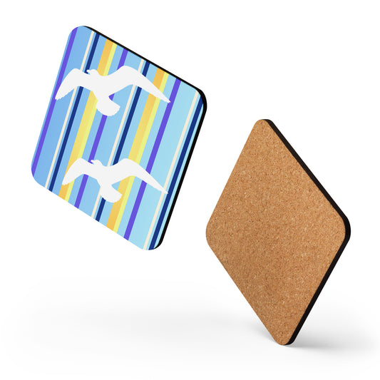 Two square Petals & Paws Shoreline coasters appear to be dancing against a white background, one showing the seagull blue striped pattern on the front, while the other shows the cork on the back.
