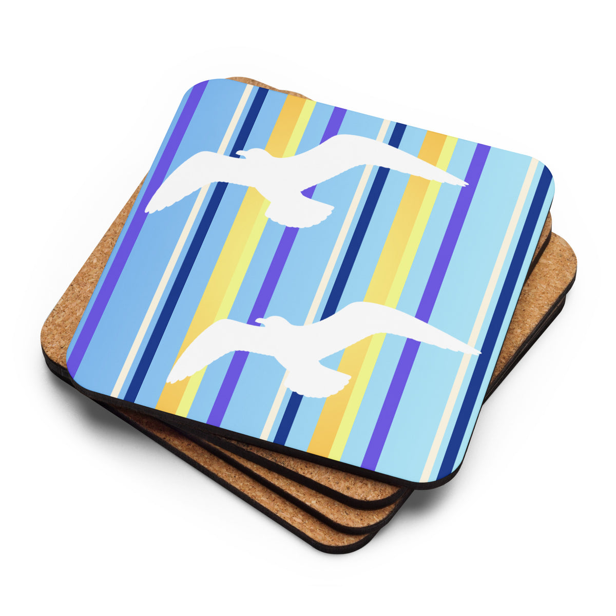 Product mockup of a stack of four Petals & Paws Shoreline Coasters.  The top one reveals seagulls are flying against a blue striped pattern, while the ones underneath are flipped upside down to reveal their cork-backs.