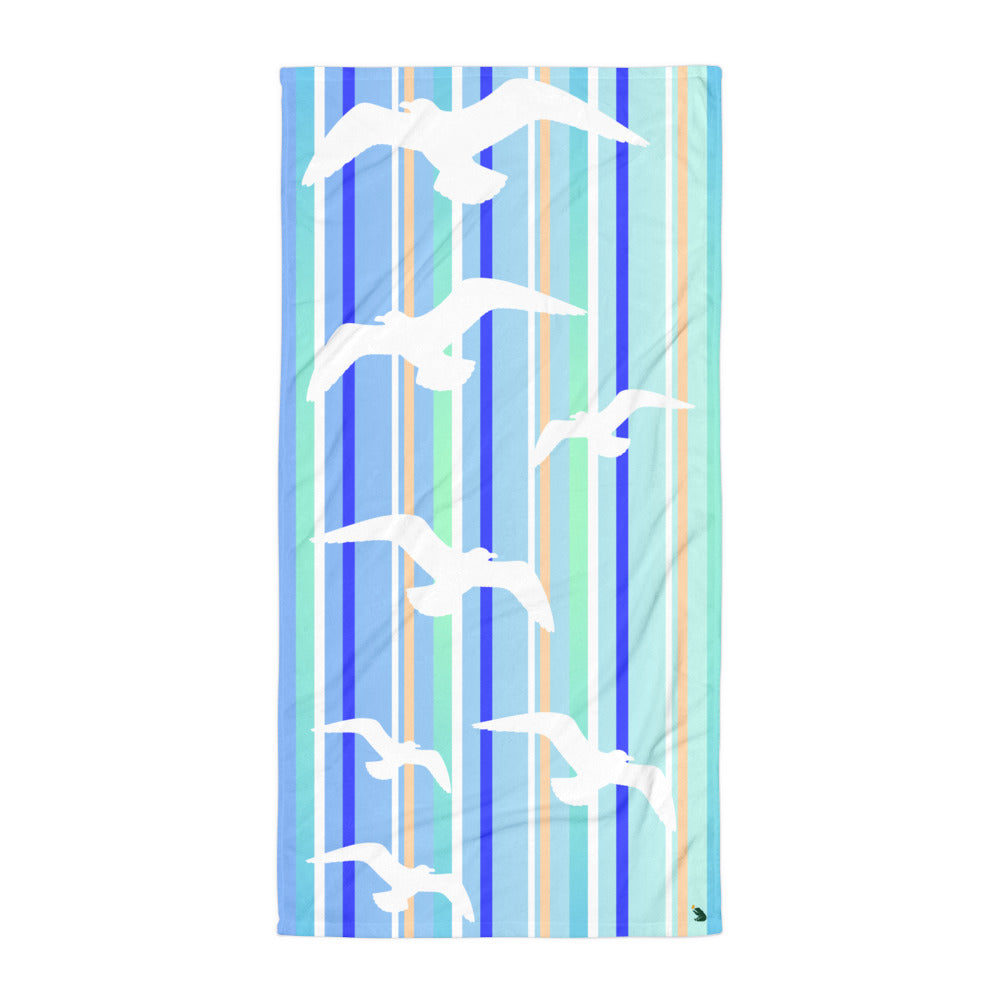 A flat-lay of 30 x 60" Petals & Paws Tide Beach Towel. This terry fabric towel features seagull design with blue striped pattern.