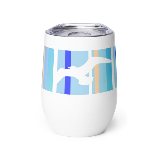Product mockup of 12 oz Petals & Paws Tide Wine Tumbler, featuring seagull design with blue striped pattern on a white surface. There is a plastic sip-lid on top.