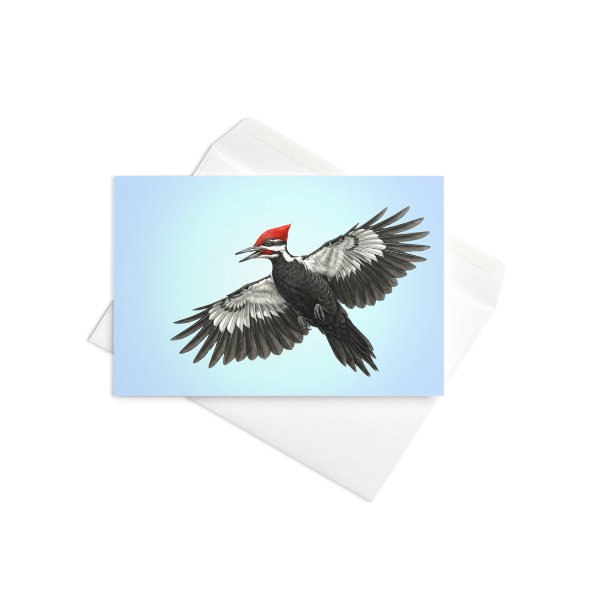 Product mockup of the Pileated Woodpecker Greeting Card, shown with the complimentary self-sealing envelope.