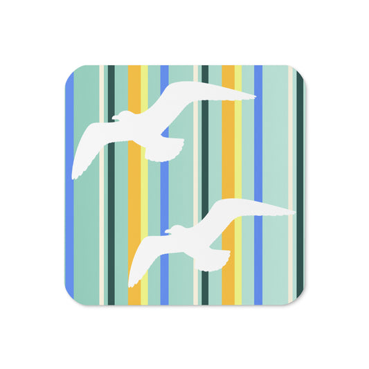 Product mockup of the front of Petals & Paws Cove Coaster cork-backed, square coaster.  Design is seagulls are flying against a teal striped pattern.
