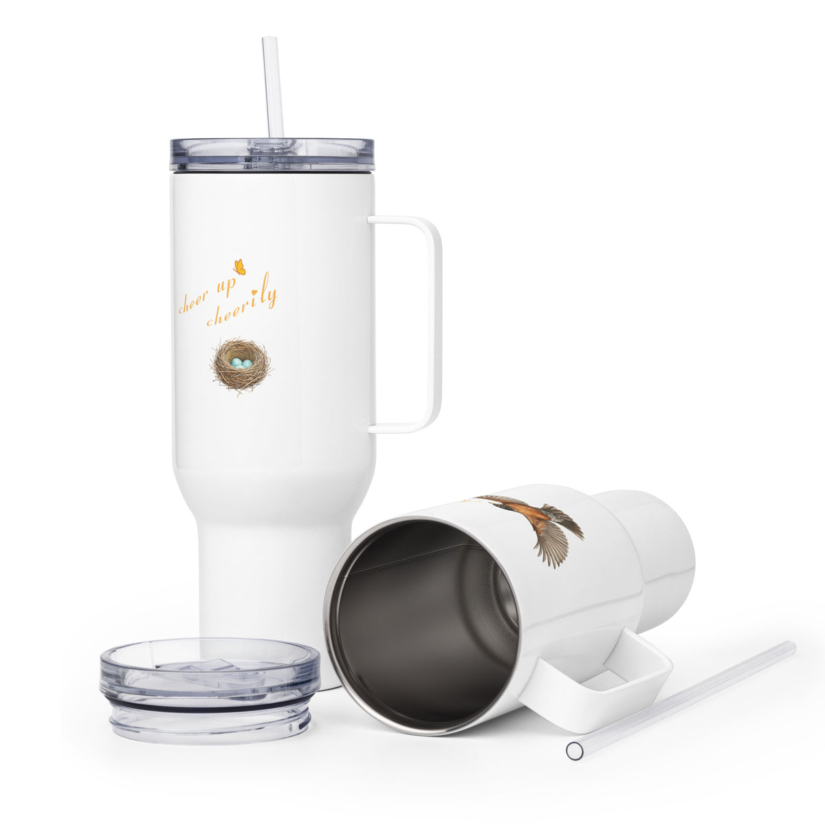 Two 40 oz Robin Discovery Travel Mugs, one upright, the other on its side to view inside. Shows lid, handle, and straw, and back-facing nest design and partial bird design.